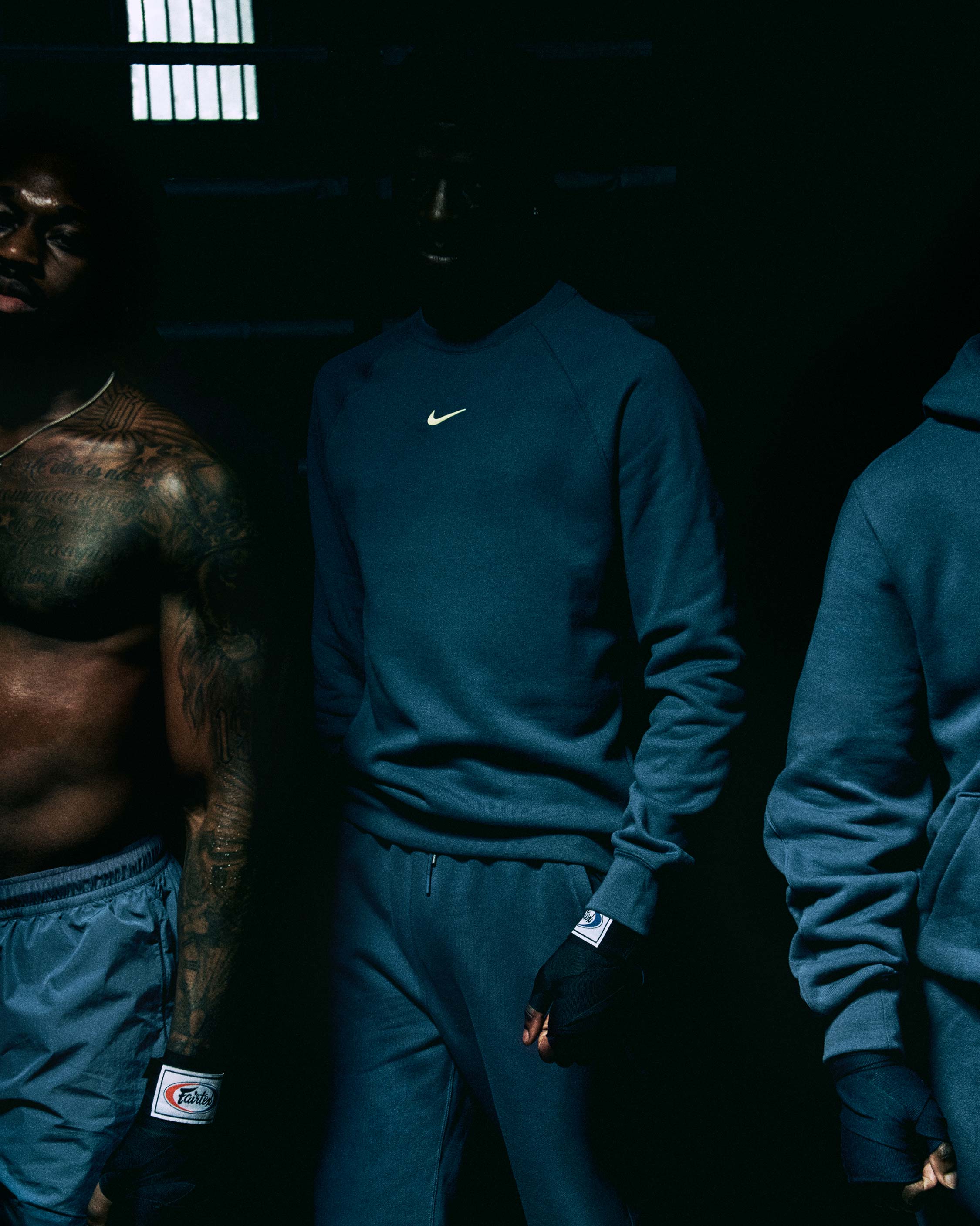 NOCTA athlete in blue tracksuit